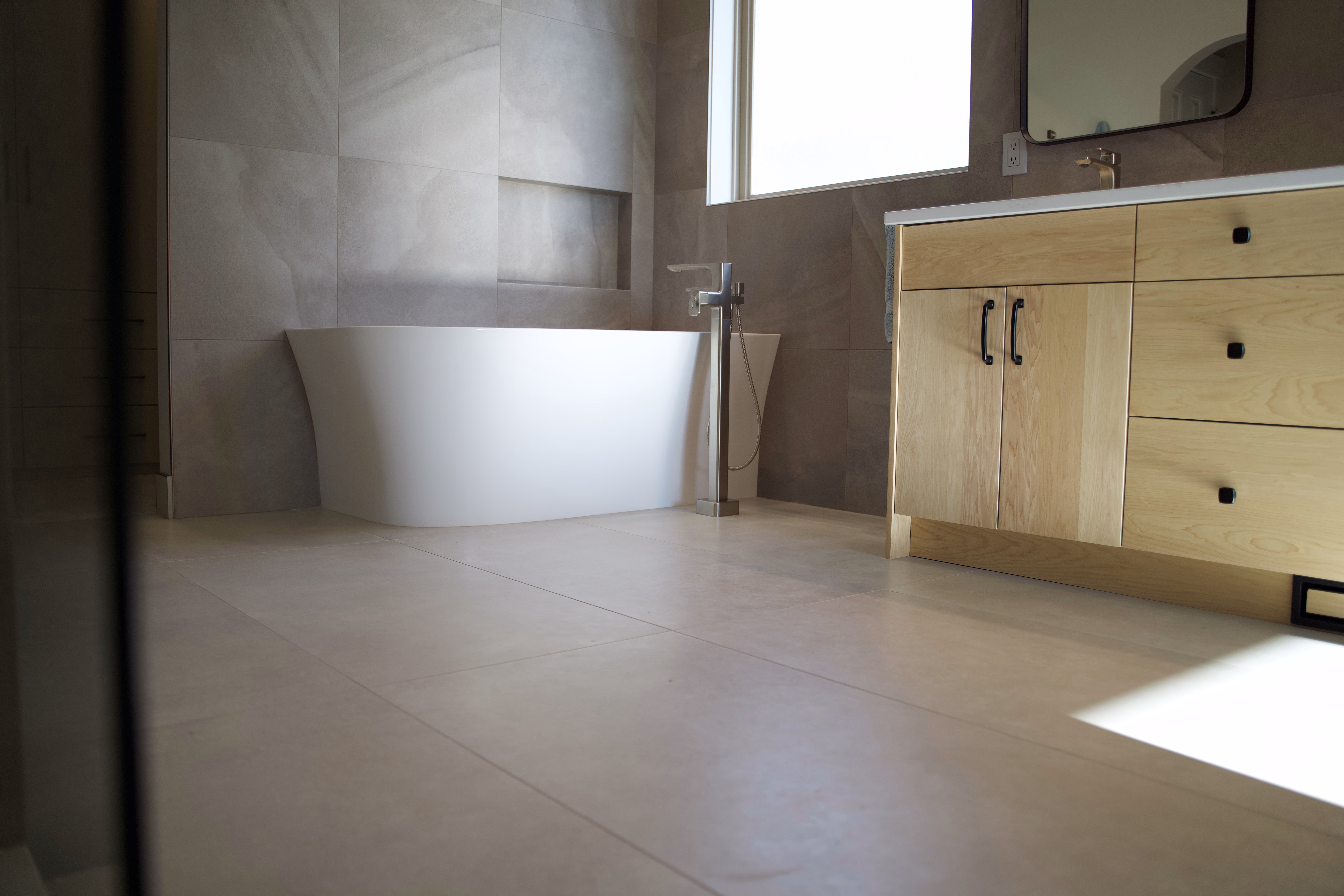 Renovated bathroom by Nailed It Developments in Kelowna